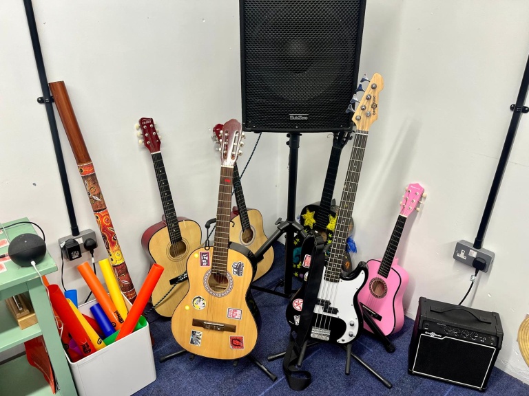 Acoustic, bass and electric guitars, a didgeridoo and boomwhackers